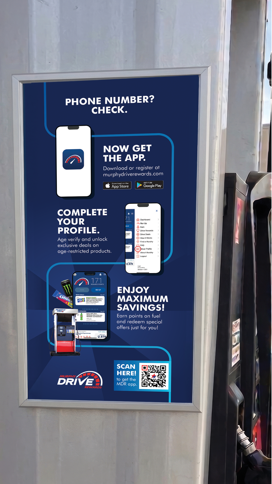 An advertising poster on a gas pump promoting the Murphy Drive Rewards app. The dark blue poster outlines stages: "Phone Number? Check." "Now Get the App," prompting users to visit murphydriverewards.com or download from the App Store or Google Play. "Complete Your Profile" to unlock exclusive deals. "Enjoy Maximum Savings!" by earning points on fuel and redeeming offers. A QR code is provided to scan and download the app directly, alongside the Murphy Drive Rewards logo at the bottom left.