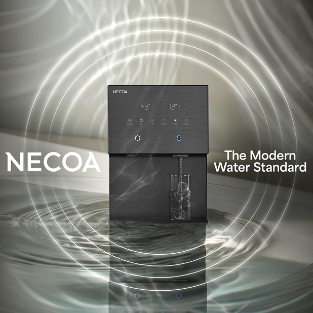A sleek, dark gray NECOA water dispenser sitting on a watery surface with circular light waves emanating from it, featuring a glass containing ice cubes being filled with water.