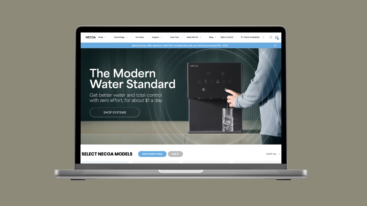 A laptop displaying the NECOA website, featuring a black water dispenser and the tagline "The Modern Water Standard".